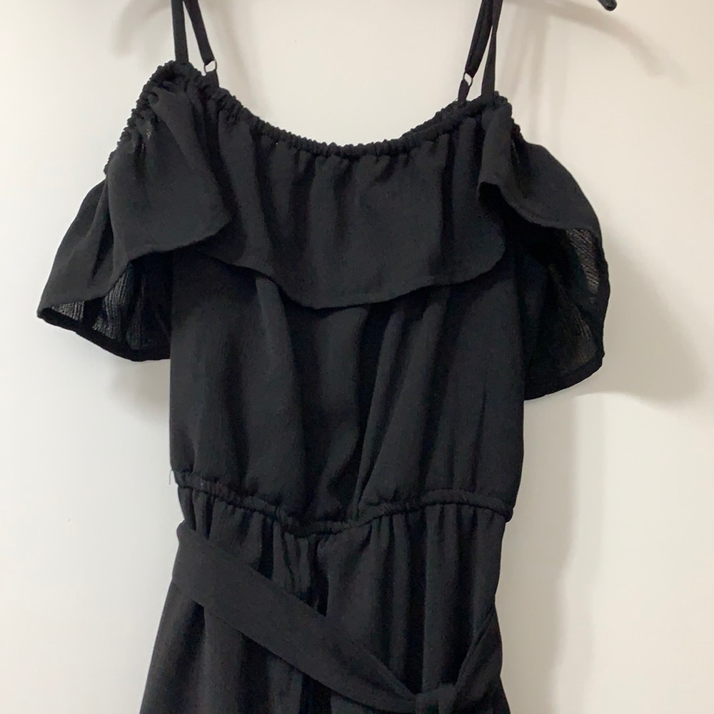 Look like a movie star in this fully lined, black, one piece outfit. Worn once.